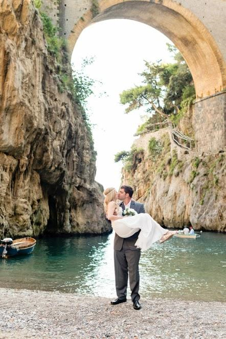 Photo by: Rochelle Cheever - This spot is not for the shy of adventure. Those who venture to the Amalfi Coast are in for breath-taking views, high cliffs, wrapping beaches, and photo ops like this. Dock the dinghy and sweep up your love because this picture is going in the album!