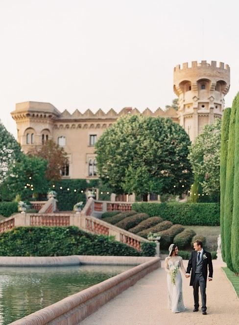 Photo by: Bryce Covey - This castle is just right for this king and queen for-the-day duo - not too big and not too small. The manicured gardens, the lake and the high castle walls are the perfect backdrop for a couple to create their dream honeymoon. Can you say perfection?