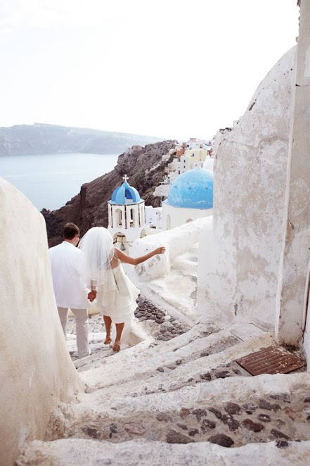 Photo by: Art2Arrange - Finally, take a note from the Greek culture and wave goodbye to the stress of the perfect pose. Wobble your way down to the white beaches and church steeples where you can relax with your new spouse and be present in their historically vibrant culture.