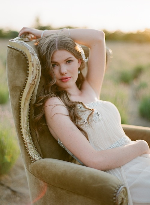 Photo by Stephanie Williams of This Modern Romance - This contemporary version of a 19th century wingback chair creates an organically flowing form, ideal for this bride’s pose and environment.  The soft velvet of the seat compliments the soft lighting of the sunset, while the colors match the tones of the field during her elegant sit.